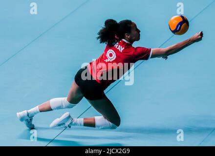 Quezon City. 16th June, 2022. Canada's Alexa Gray (R) spikes during the