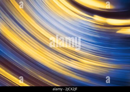Abstract blue and yellow light trails Stock Photo