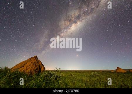 The Milky Way over termite mounds in Cape Range National Park, Exmouth, Western Australia, Australia, Pacific Stock Photo