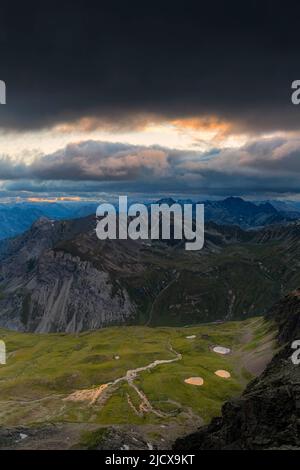 Mountain lakes from above illuminated by sunset, Stelvio Mountain pass, Stelvio National Park, Valtellina, Lombardy, Italy, Europe Stock Photo