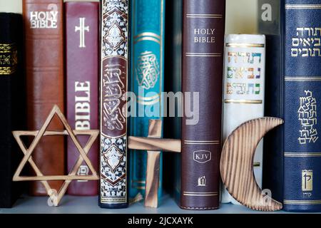 Christianity, Islam and Judaism, Bible, Quran and Torah, interreligious symbols, faith and spirituality concept, France, Europe Stock Photo