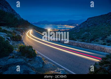 View of trail lights on road to Port de Pollenca at Mirador Es Colomer, Pollenca, Majorca, Balearic Islands, Spain, Mediterranean, Europe Stock Photo