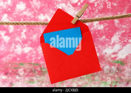 Note paper hanging on clothesline Stock Photo