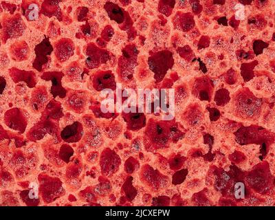 Red texture of decor sponge as abstract background Stock Photo