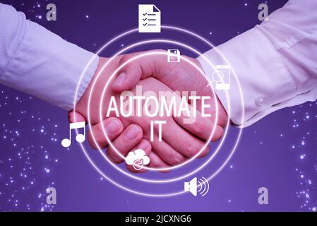 Text showing inspiration Automate It. Word for convert process or facility to be operated automatic equipment. Hands shaking presenting innovative Stock Photo