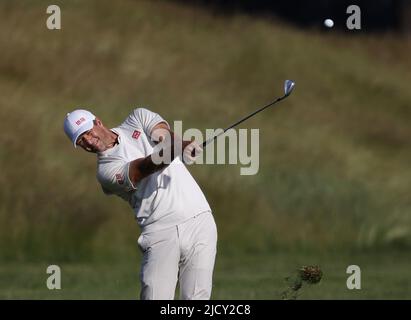 New York, United States. 16th June, 2022. Adam Scott of Australia hits his approach shot to the first hole in the first round of the 122nd United States Open Championship at The Country Club in Brookline, MA on Thursday, June 16, 2022. Photo by John Angelillo/UPI Credit: UPI/Alamy Live News Stock Photo