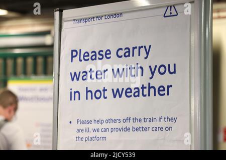 A sign is displayed in South Kensington tube station, central London. Picture date: Thursday June 16, 2022. Stock Photo