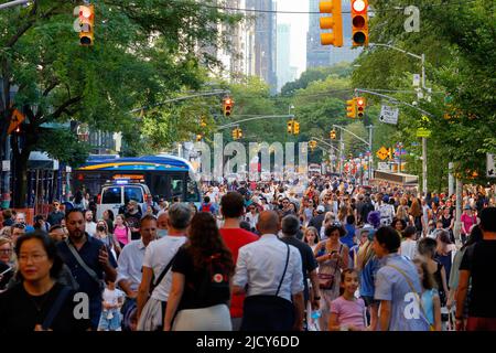People and crowds at the Museum Mile Festival along Manhattan's Fifth Avenue in New York, NY, June 14, 2022. Stock Photo