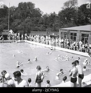 1940s, historical, school children playing with a skipping rope in a ...