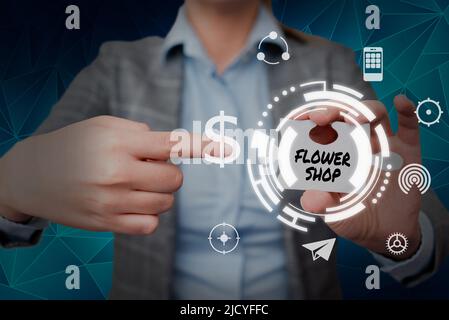 Writing displaying text Flower Shop, Word for where cut flowers are sold with decorations for gifts Lady in suit pointing puzzle piece representing in Stock Photo