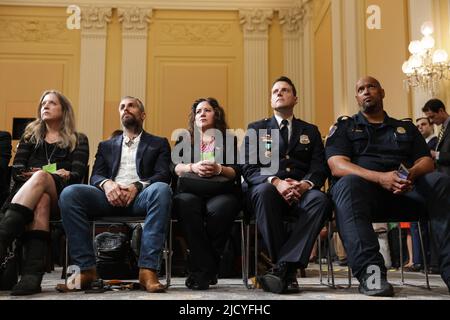 Washington, USA. 16th June, 2022. Michael Fanone, law enforcement analyst and former police officer (2nd from left), Sandra Garza, the long-time partner of fallen Capitol Police Officer Brian Sicknick (center), D.C. Metropolitan Police Officer Daniel Hodges (2nd from right), and Harry Dunn, US Capitol Police officer (far right) listen during The Select Committee to Investigate the January 6th Attack on the United States Capitol hearing happening in the 390 Cannon House Office Building in Washington, DC on June 16, 2022. (Photo by Oliver Contreras/Sipa USA) Credit: Sipa USA/Alamy Live News Stock Photo