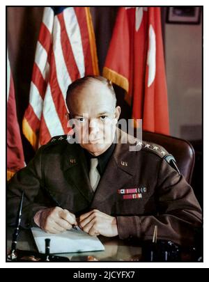 EISENHOWER WW2 Portrait of American military commander (and future US President) General Dwight D Eisenhower in military uniform (1890 - 1969) as he sits at his desk at Allied Command Headquarters December 1943. Supreme Allied Commander World War II Stock Photo