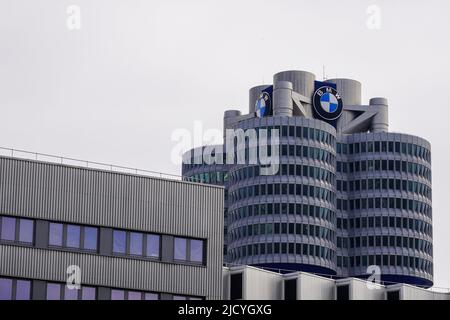 The BMW Tower, the BMW four-cylinder is the main administration building and landmark of the car manufacturer BMW in Munich, Germany, 22.4.22 Stock Photo
