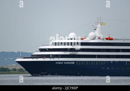 16/06/2022 Gravesend Reach UK Luxury cruise ship World Navigator cruising the River Thames near Gravesend. The expedition-style cruise ship’s smaller Stock Photo