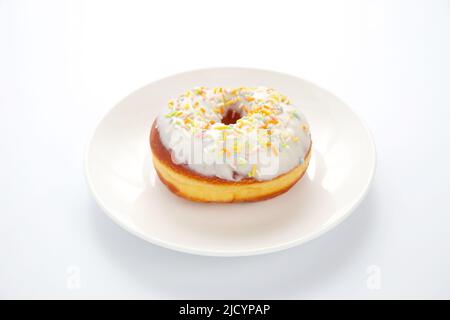 frosted doughnut isolated on white background Stock Photo