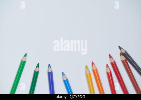 colored pencils on a white background with copy space Stock Photo