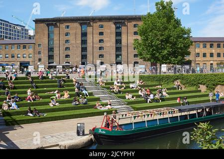 Steps by the Regents Canal at Granary Square, Kings Cross, London UK, in summertime Stock Photo