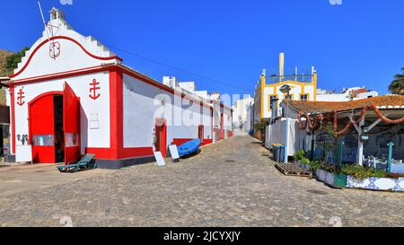 Cobbled Rua Vasco da Gama Street housing the ancient lifeguard station. Alvor Portimao-Portugal-342 Stock Photo