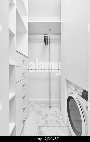 Photo of dressing room and washing machine  Stock Photo