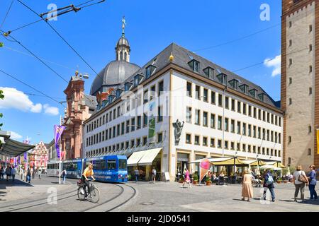 Würzburg, Germany - June 2022: Cafe called 'Bassanese Cafe am Dom' and 'Lindt' Chocolaterie at dome street square in old town Stock Photo