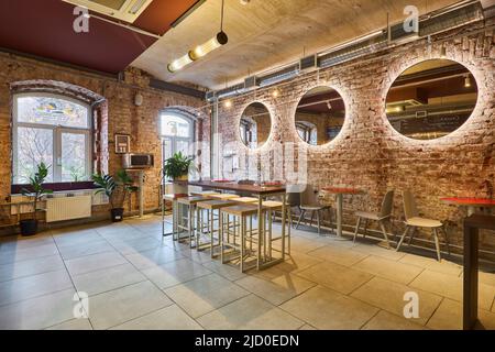 Photo of cafe interior during daytime with artificial light  Stock Photo