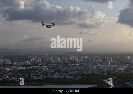 An MV-22B Osprey assigned to Marine Medium Tiltrotor Squadron (VMM) 266 prepares to land during French-Caribbean exercise Caraibes 22 near San Juan, Puerto Rico, June 13, 2022. Caraibes 22 is a French-led, large-scale, joint-training exercise in the Caribbean involving naval, air, and land assets from the French, U.S., and regional forces focused on responding to simulated-natural disasters. VMM-266 is a subordinate unit to 2nd Marine Aircraft Wing, which is the aviation combat element of II Marine Expeditionary Force. (U.S. Marine Corps photo by Cpl. Caleb Stelter) Stock Photo