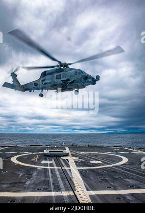 PHILIPPINE SEA (June 7, 2022) Operations Specialist Rodney Ragin, from ...