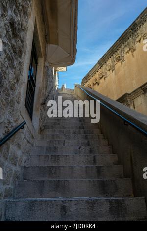 The Pile Gate stairway leading to the top of the Old Town Wall fortress in Dubrovnik Stock Photo