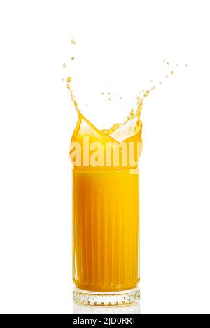 orange juice splash isolated on white. glass of splashing orange juice. close up. stock photo Stock Photo