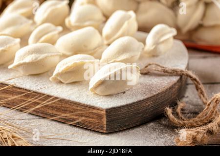 Semi finished pelmeni dumplings Stock Photo