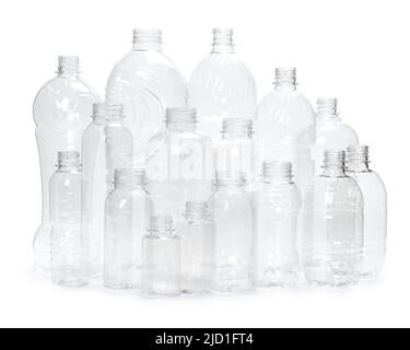 many different empty plastic bottles isolated on white background. production of new containers Stock Photo