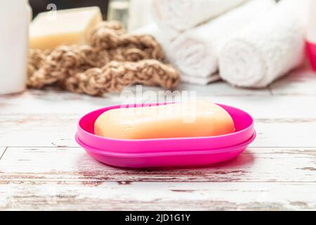 soap on pink plastic soap dish isolated on white background Stock Photo