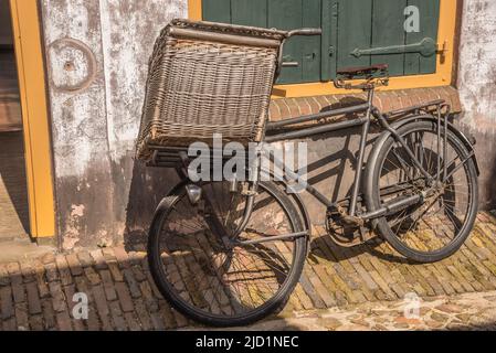 Enkhuizen, Netherlands. Old-fashioned means of transport from the last century at the Zuiderzee Museum in Enkhuizen. High quality photo Stock Photo