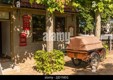 Enkhuizen, Netherlands. Old-fashioned means of transport from the last century at the Zuiderzee Museum in Enkhuizen. High quality photo Stock Photo