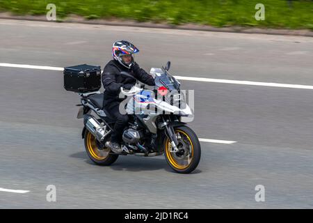 BMW 1250 GS; driving on the M6 Motorway, Manchester, UK Stock Photo