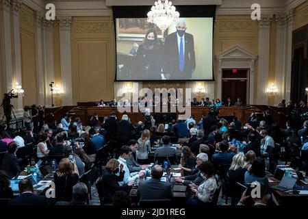 WASHINGTON, DC - JUNE 16: An image of former Vice President Mike Pence on the night of January 6th, 2021 is displayed during the third hearing of the House Select Committee to Investigate the January 6th Attack on the U.S. Capitol in the Cannon House Office Building on June 16, 2022 in Washington, DC. The bipartisan committee, which has been gathering evidence for almost a year related to the January 6 attack at the U.S. Capitol, is presenting its findings in a series of televised hearings. On January 6, 2021, supporters of former President Donald Trump attacked the U.S. Capitol Building durin Stock Photo