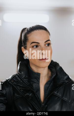 Portrait of young woman looking away Stock Photo