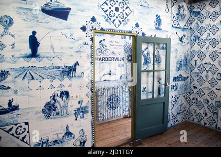 Enkhuizen, Netherlands, June 2022.An interior made of Delft blue wallpaper in the open air museum in Enkhuizen. High quality photo. Selective focus. Stock Photo