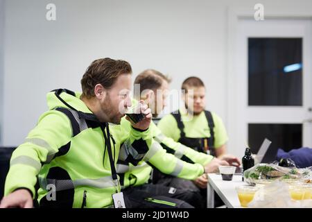 Workers having break Stock Photo