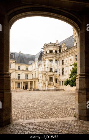 Château of Blois, interior façades in Classic, Renaissance style. The Château's the spiral staircase in the Francis I wing. Blois is a commune and the Stock Photo