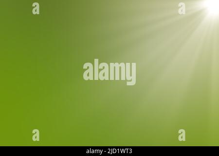 Sunbeams on a blurred green background. Background for design, postcards and copy space Stock Photo