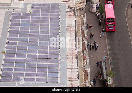 Solar panels on a building roof top in Belfast City Centre, Northern Ireland. Stock Photo