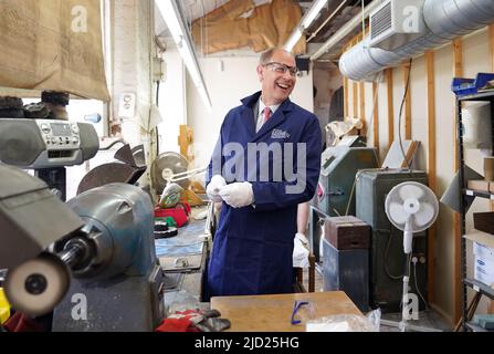 The Earl of Wessex, polishing a Commonwealth games medals during a visit to Toye, Kenning and Spencer in Birmingham. Picture date: Friday June 17, 2022. Stock Photo