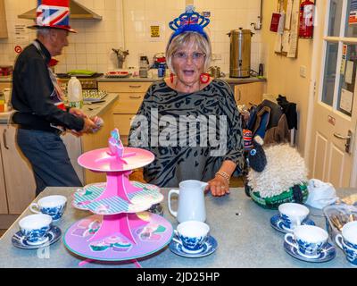 Tea and cake served at Easton Methodist Church Hall during the Queen's Platinum Jubilee celebrations. Stock Photo