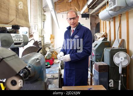 The Earl of Wessex, polishing a Commonwealth games medal during a visit to Toye, Kenning and Spencer in Birmingham. Picture date: Friday June 17, 2022. Stock Photo