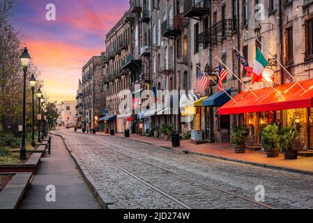 Savannah, Georgia, USA bars and restaurants on River Street at dawn. Stock Photo