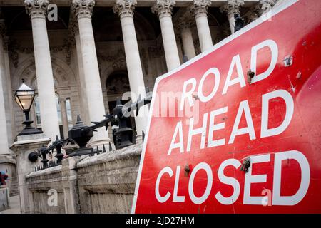 A road closure sign leans against a wall outside Royal Exchange in the heart of the City of London, on 13th June 2022, in London, England. Stock Photo
