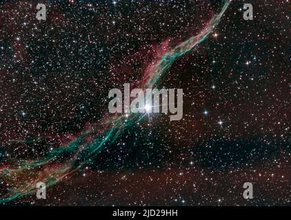 Western Veil nebula (NGC 6960) with the foreground star 52 Cygni in the constellation Cygnus. Stock Photo