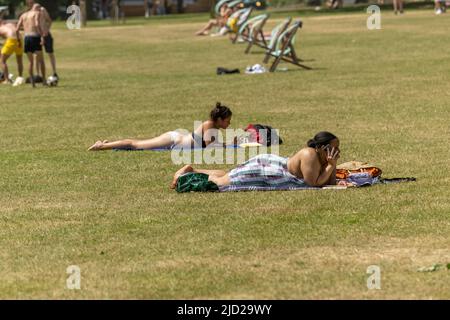 London, UK. 17th June, 2022. UK Weather a busy St James Park London on the hottest day of the year with many taken advantage of the weather to sunbath Credit: Ian Davidson/Alamy Live News Stock Photo