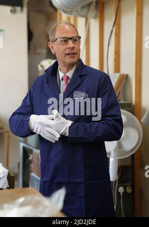 The Earl of Wessex, polishing a Commonwealth games medal during a visit to Toye, Kenning and Spencer in Birmingham. Picture date: Friday June 17, 2022. Stock Photo